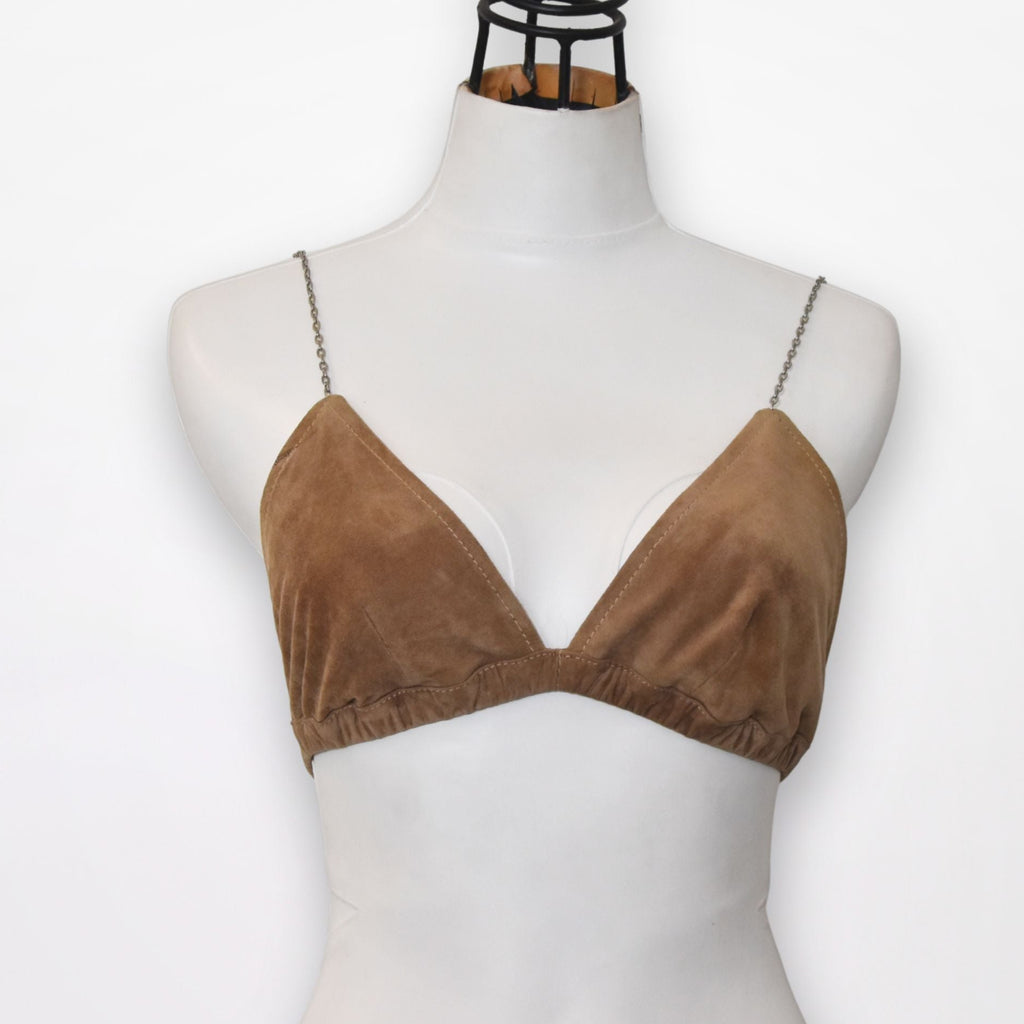 Brown velvet bralette on a mannequin against a white background